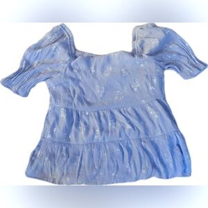 Francesca’s Jun & Ivy Medium blue floral top. Charlee tiered babydoll blouse.